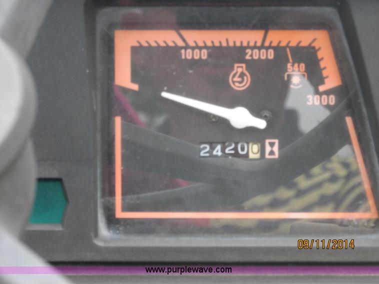 image for item J2414 Ford 1320 MFWD tractor