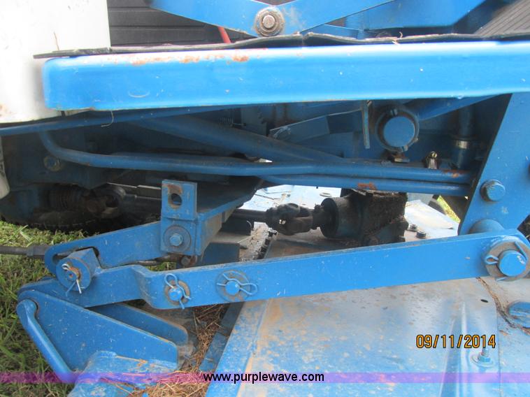 image for item J2414 Ford 1320 MFWD tractor