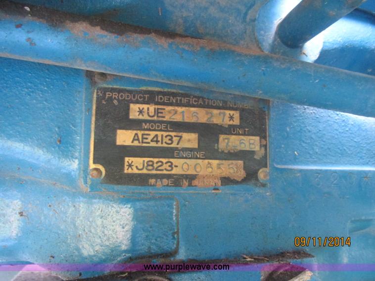 image for item J2414 Ford 1320 MFWD tractor