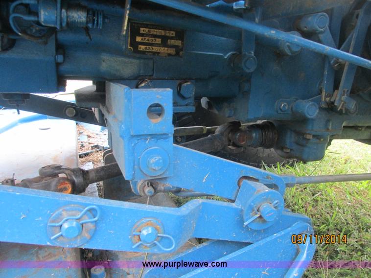 image for item J2414 Ford 1320 MFWD tractor