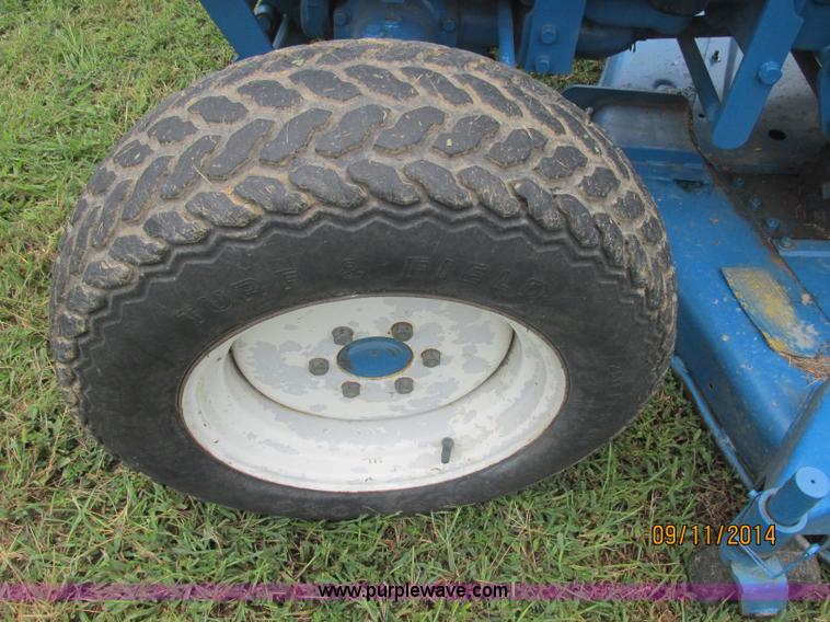 image for item J2414 Ford 1320 MFWD tractor