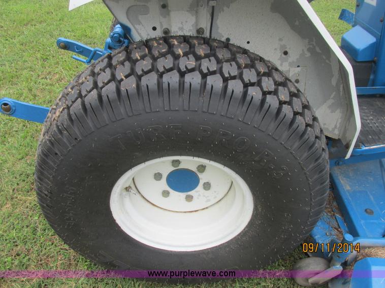 image for item J2414 Ford 1320 MFWD tractor