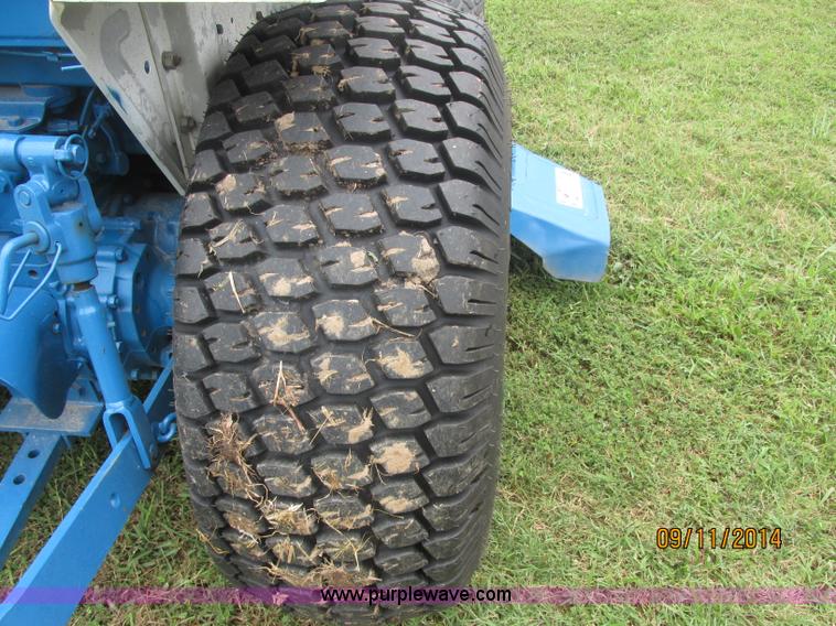 image for item J2414 Ford 1320 MFWD tractor