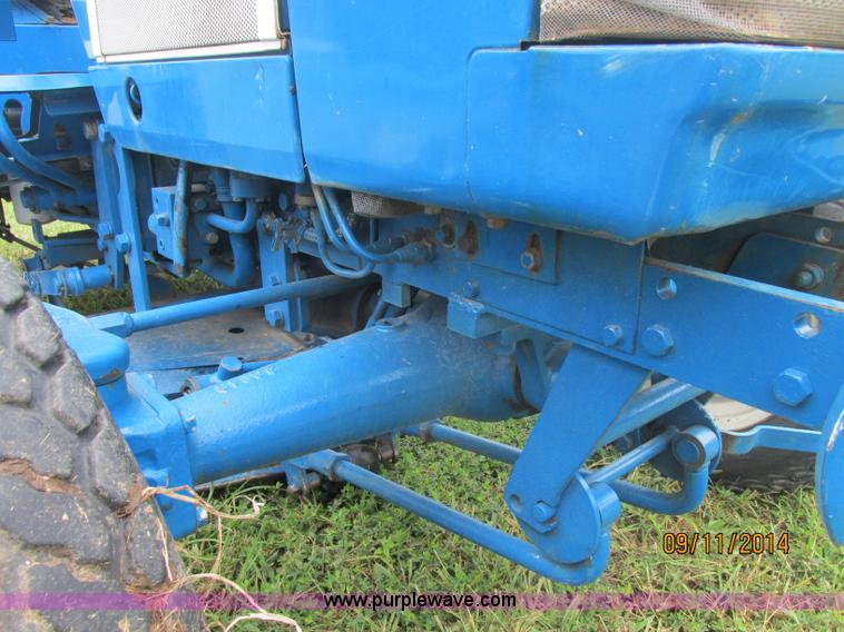 image for item J2414 Ford 1320 MFWD tractor