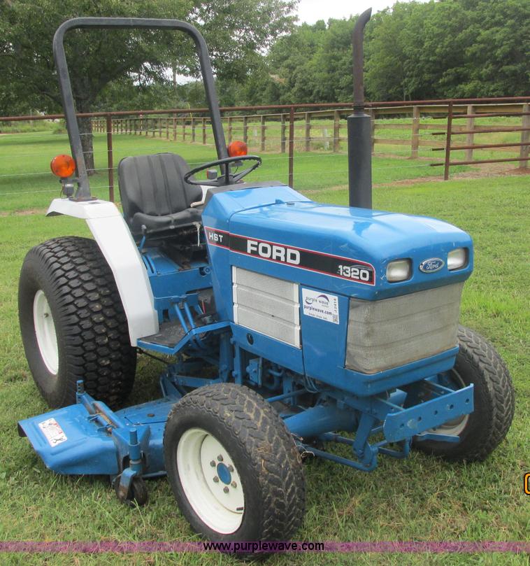 image for item J2414 Ford 1320 MFWD tractor