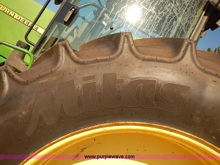 image for item J3122 1997 John Deere 8300 MFWD tractor