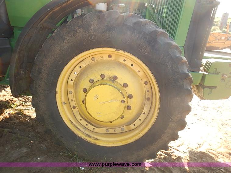 image for item J3122 1997 John Deere 8300 MFWD tractor
