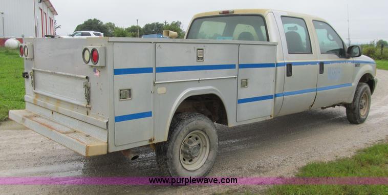 image for item E4986 2001 Ford F350 Super Duty XL Crew Cab utility truck