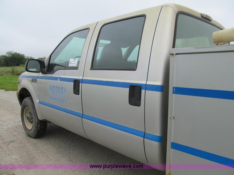 image for item E4986 2001 Ford F350 Super Duty XL Crew Cab utility truck