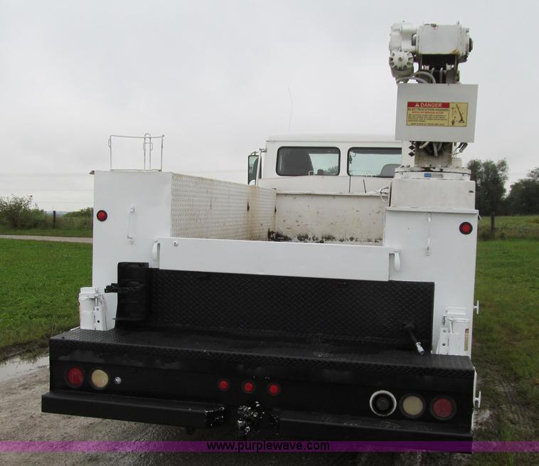 image for item E4987 1999 Freightliner FL60 service truck