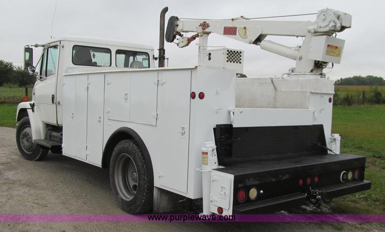 image for item E4987 1999 Freightliner FL60 service truck