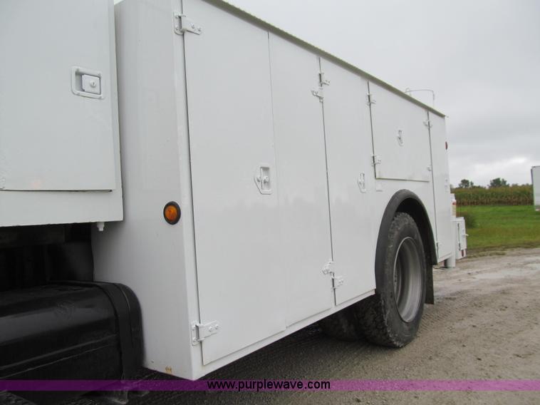 image for item E4987 1999 Freightliner FL60 service truck