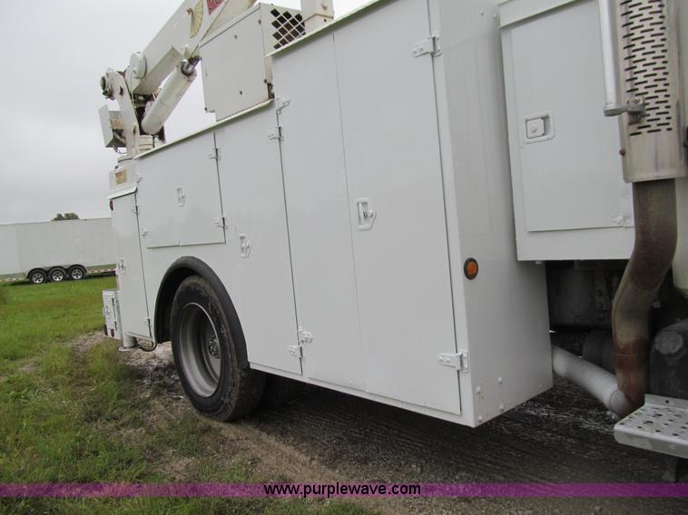 image for item E4987 1999 Freightliner FL60 service truck