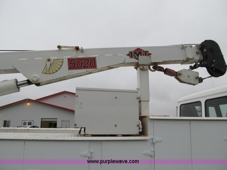 image for item E4987 1999 Freightliner FL60 service truck