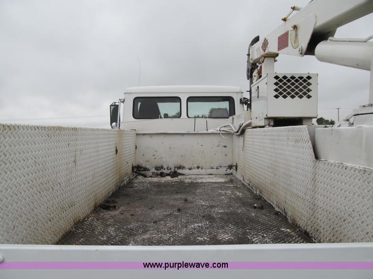 image for item E4987 1999 Freightliner FL60 service truck