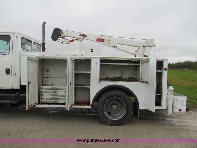 image for item E4987 1999 Freightliner FL60 service truck