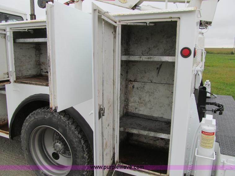 image for item E4987 1999 Freightliner FL60 service truck