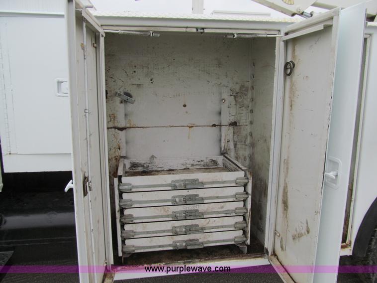 image for item E4987 1999 Freightliner FL60 service truck