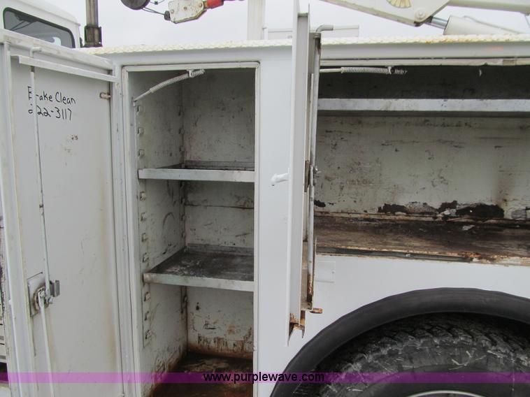 image for item E4987 1999 Freightliner FL60 service truck