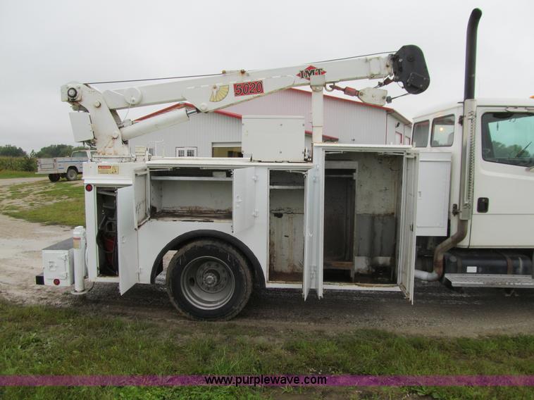 image for item E4987 1999 Freightliner FL60 service truck