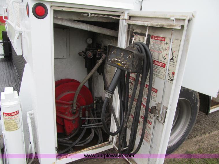 image for item E4987 1999 Freightliner FL60 service truck