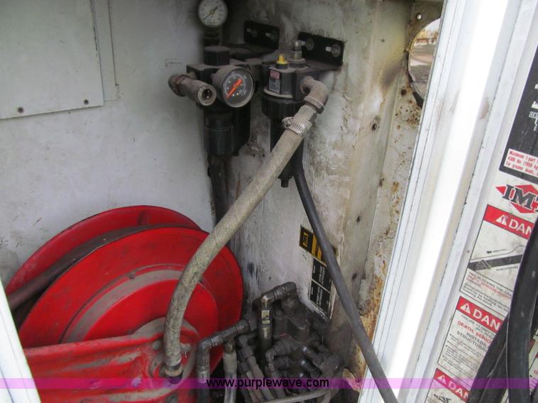 image for item E4987 1999 Freightliner FL60 service truck