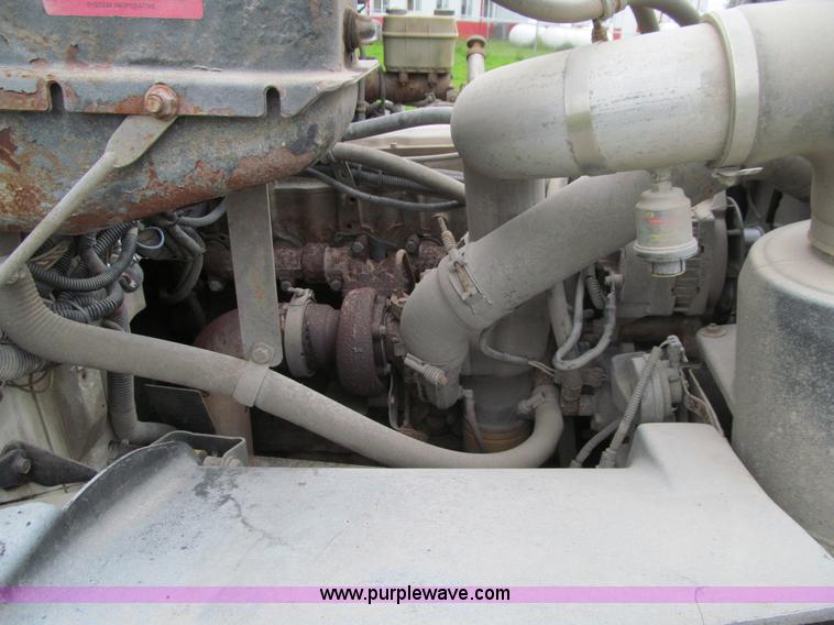 image for item E4987 1999 Freightliner FL60 service truck