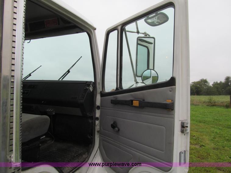 image for item E4987 1999 Freightliner FL60 service truck