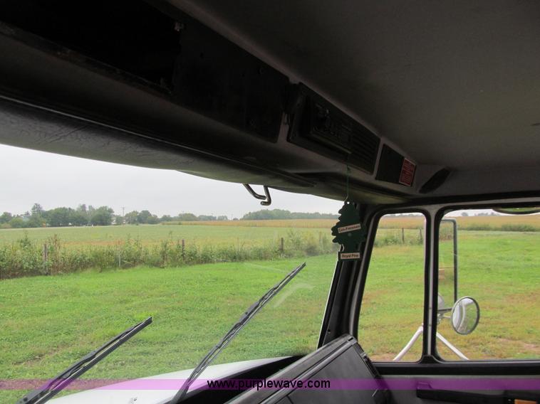 image for item E4987 1999 Freightliner FL60 service truck