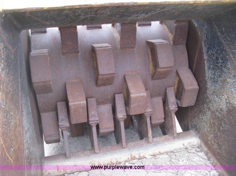 image for item E7893 Felco 36"W excavator bucket with pad foot roller