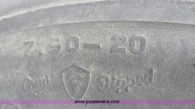 image for item G9097 1984 Chevrolet 60 flatbed truck with backhoe attachment