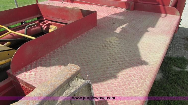 image for item G9097 1984 Chevrolet 60 flatbed truck with backhoe attachment