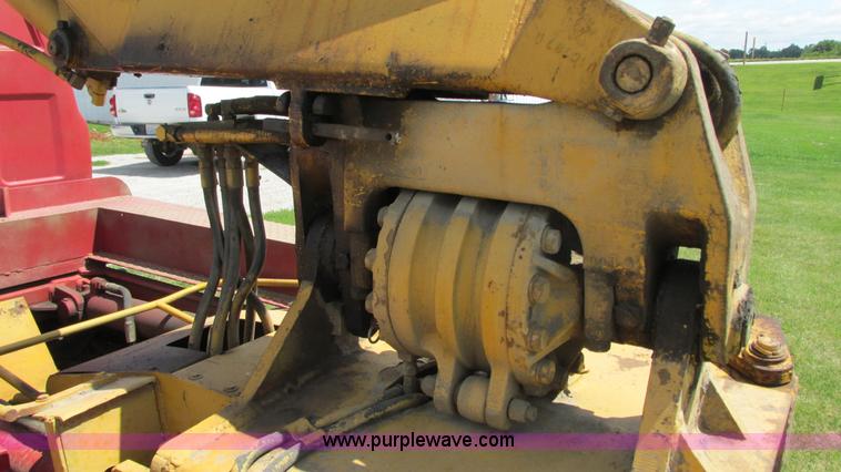 image for item G9097 1984 Chevrolet 60 flatbed truck with backhoe attachment