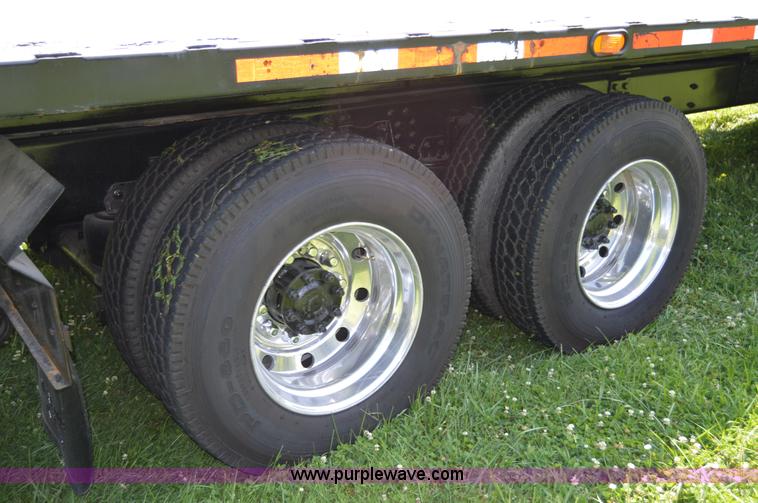 image for item H2873 1999 Volvo WG rollback truck