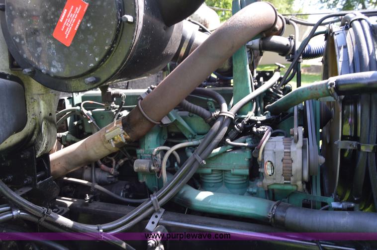 image for item H2873 1999 Volvo WG rollback truck