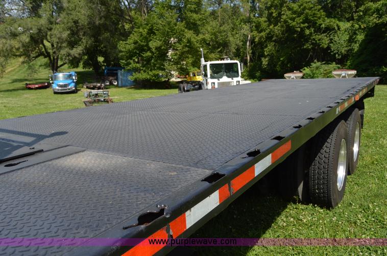 image for item H2873 1999 Volvo WG rollback truck