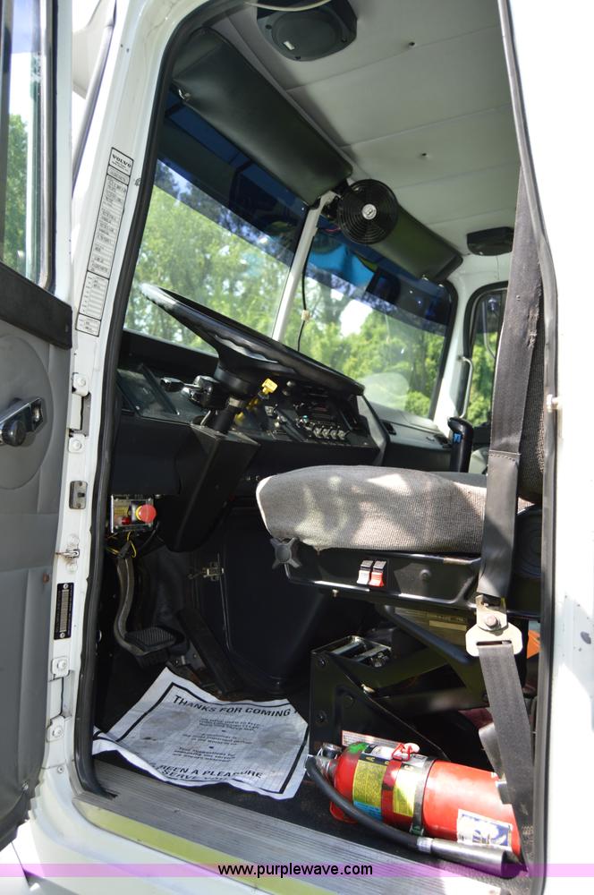 image for item H2873 1999 Volvo WG rollback truck