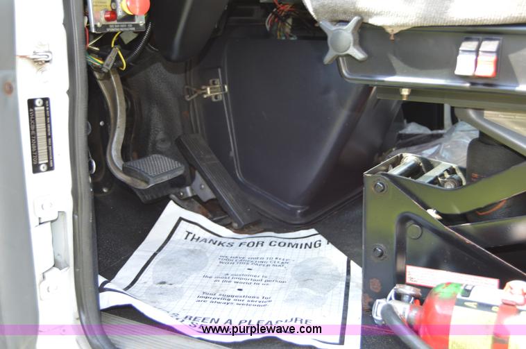 image for item H2873 1999 Volvo WG rollback truck