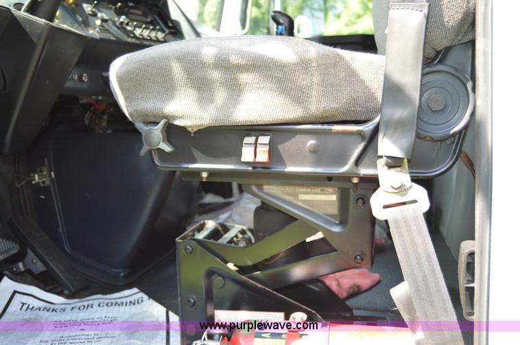 image for item H2873 1999 Volvo WG rollback truck