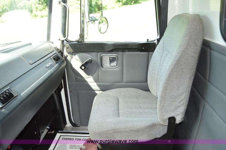 image for item H2873 1999 Volvo WG rollback truck