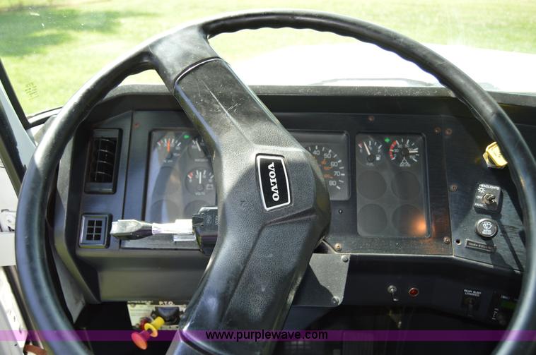 image for item H2873 1999 Volvo WG rollback truck