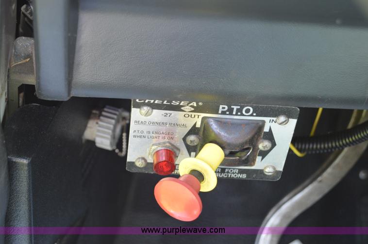 image for item H2873 1999 Volvo WG rollback truck