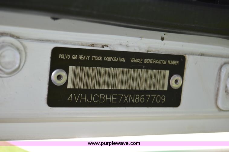 image for item H2873 1999 Volvo WG rollback truck