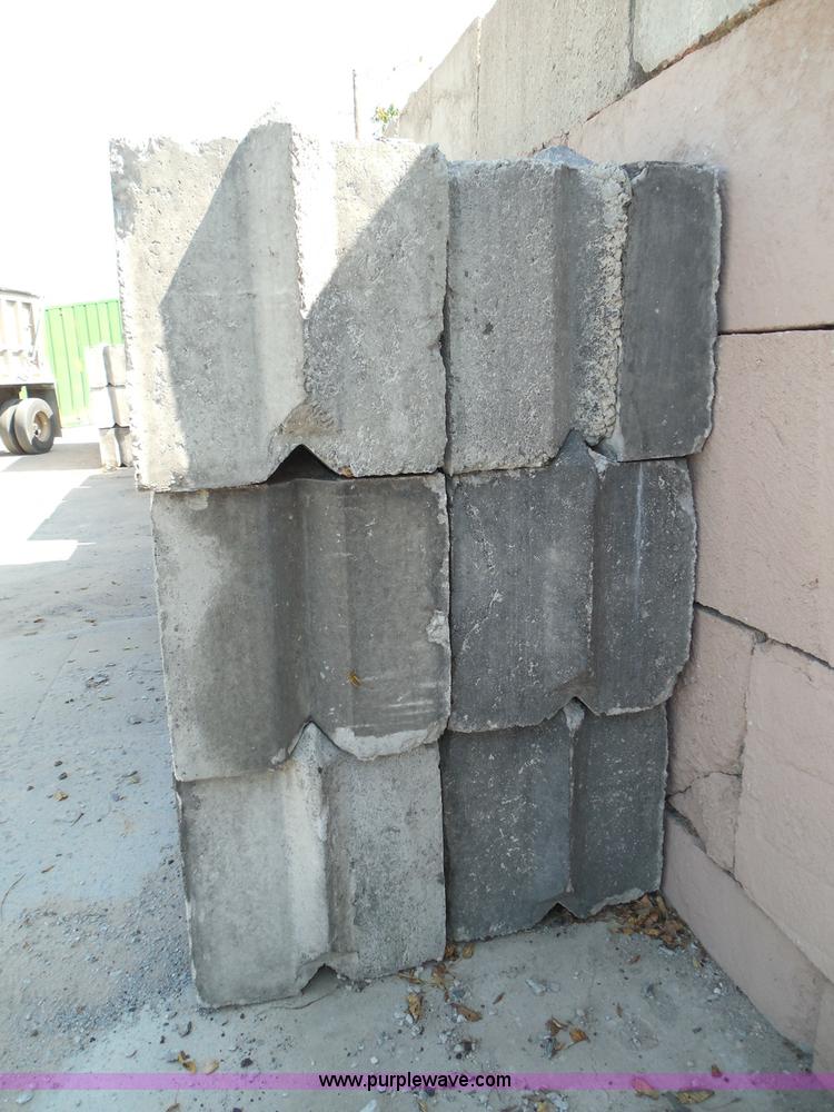 image for item I3287 (24) stacking concrete bunker blocks