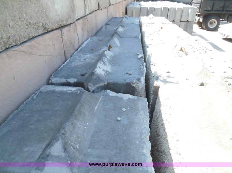 image for item I3287 (24) stacking concrete bunker blocks