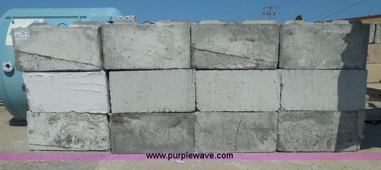 image for item I3290 (24) stacking concrete bunker blocks