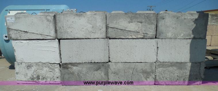 image for item I3290 (24) stacking concrete bunker blocks