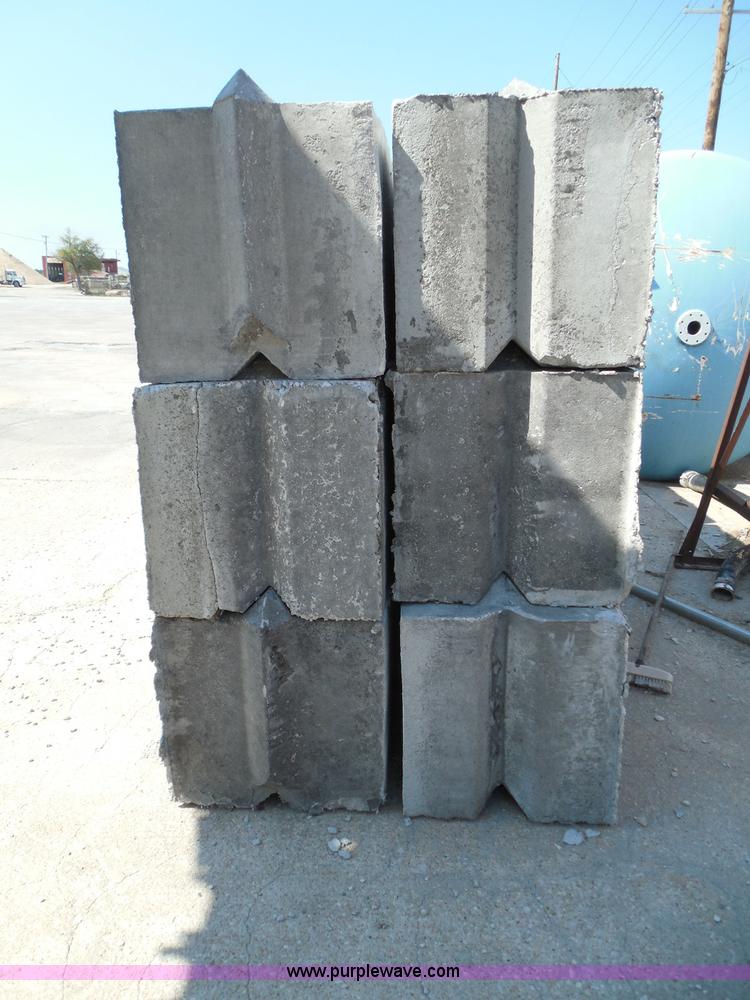 image for item I3290 (24) stacking concrete bunker blocks