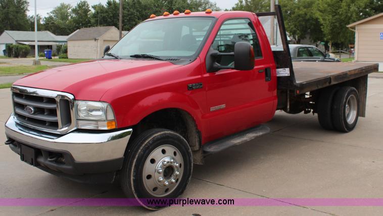 image for item I5855 2004 Ford F550 Super Duty XLT flatbed truck