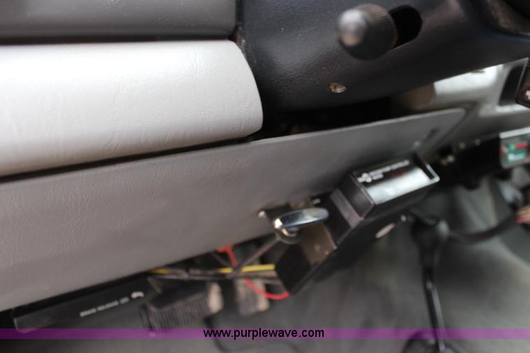 image for item I5855 2004 Ford F550 Super Duty XLT flatbed truck